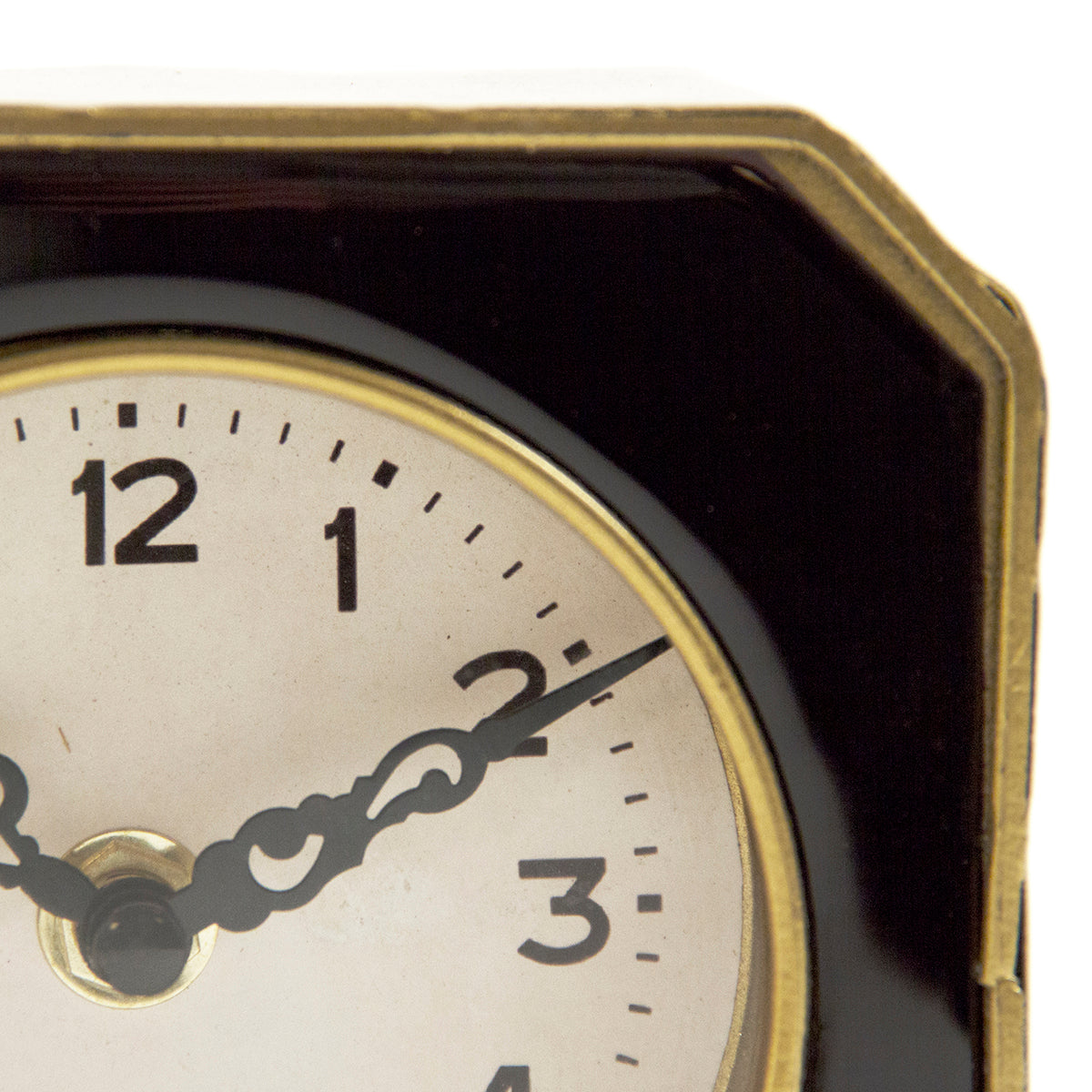 Stylish black and gold table clock with a rustic distressed finish, ideal for vintage and antique-inspired interiors.