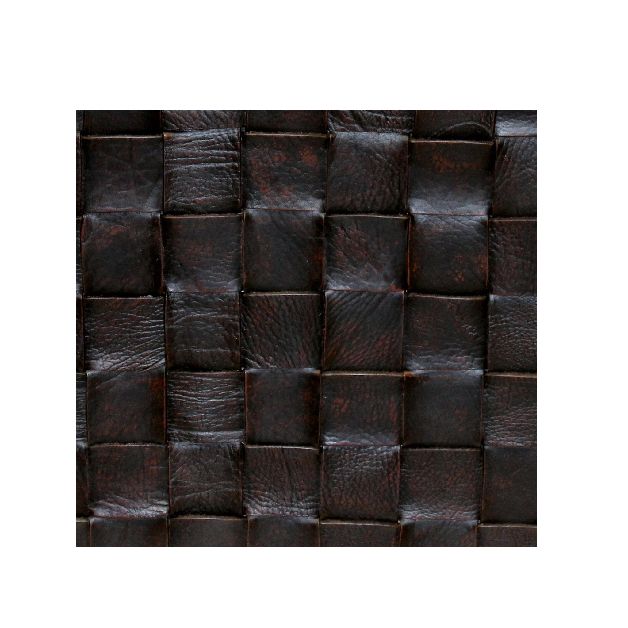 Casual leather pouf bringing refined elegance to everyday spaces.