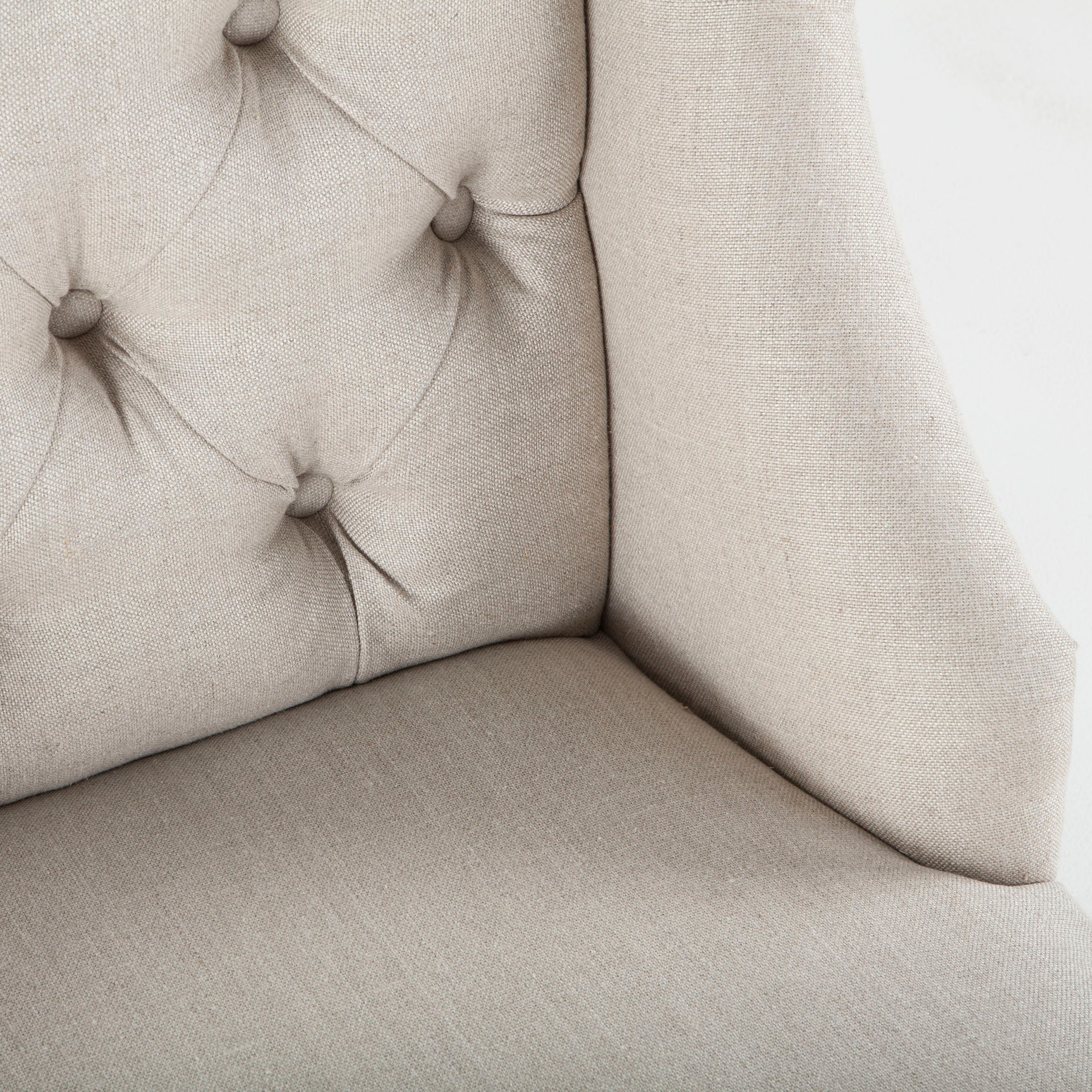 Dining chair with linen-blend high back and white oak legs in distressed finish