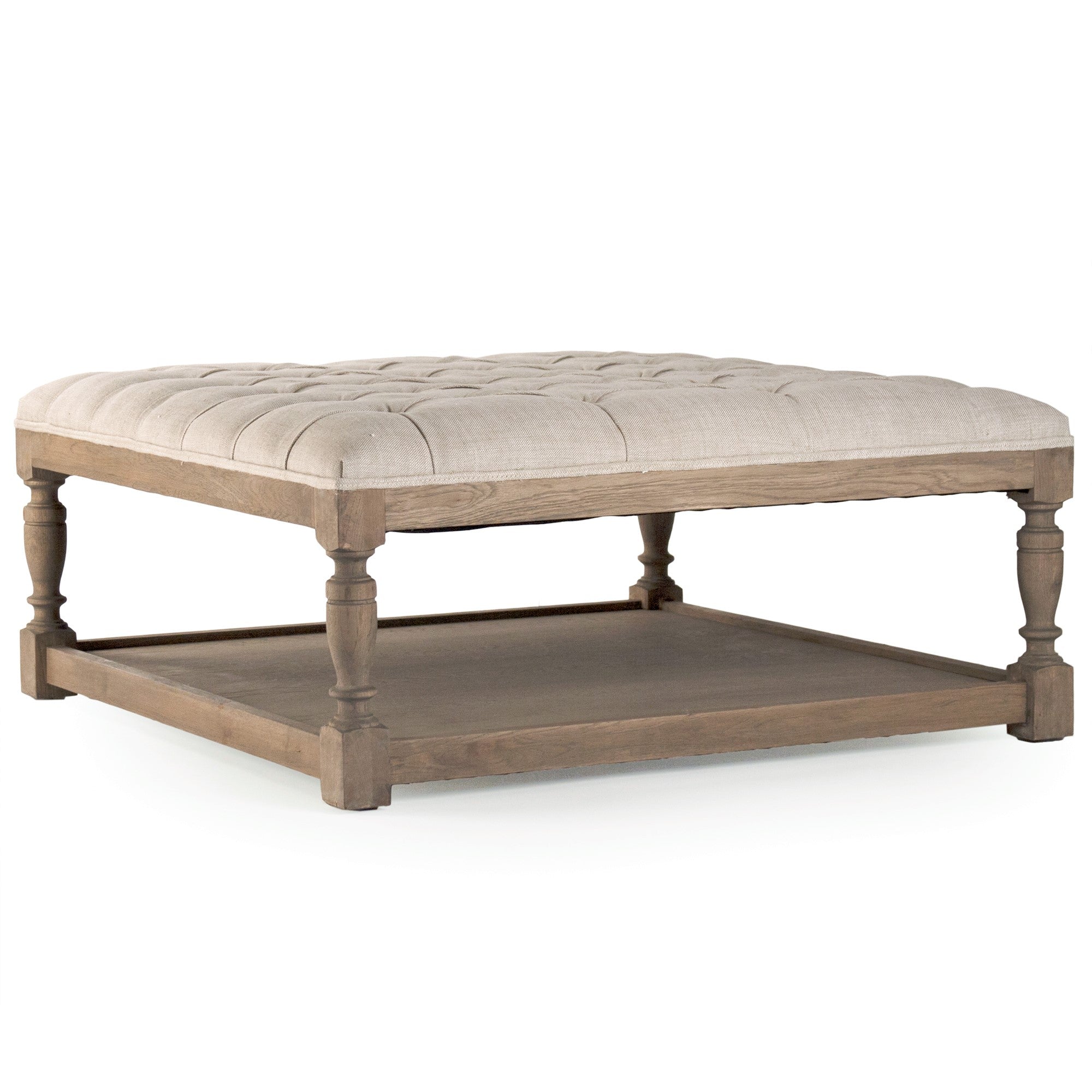 Neutral tufted ottoman that fits seamlessly into modern or classic interiors.