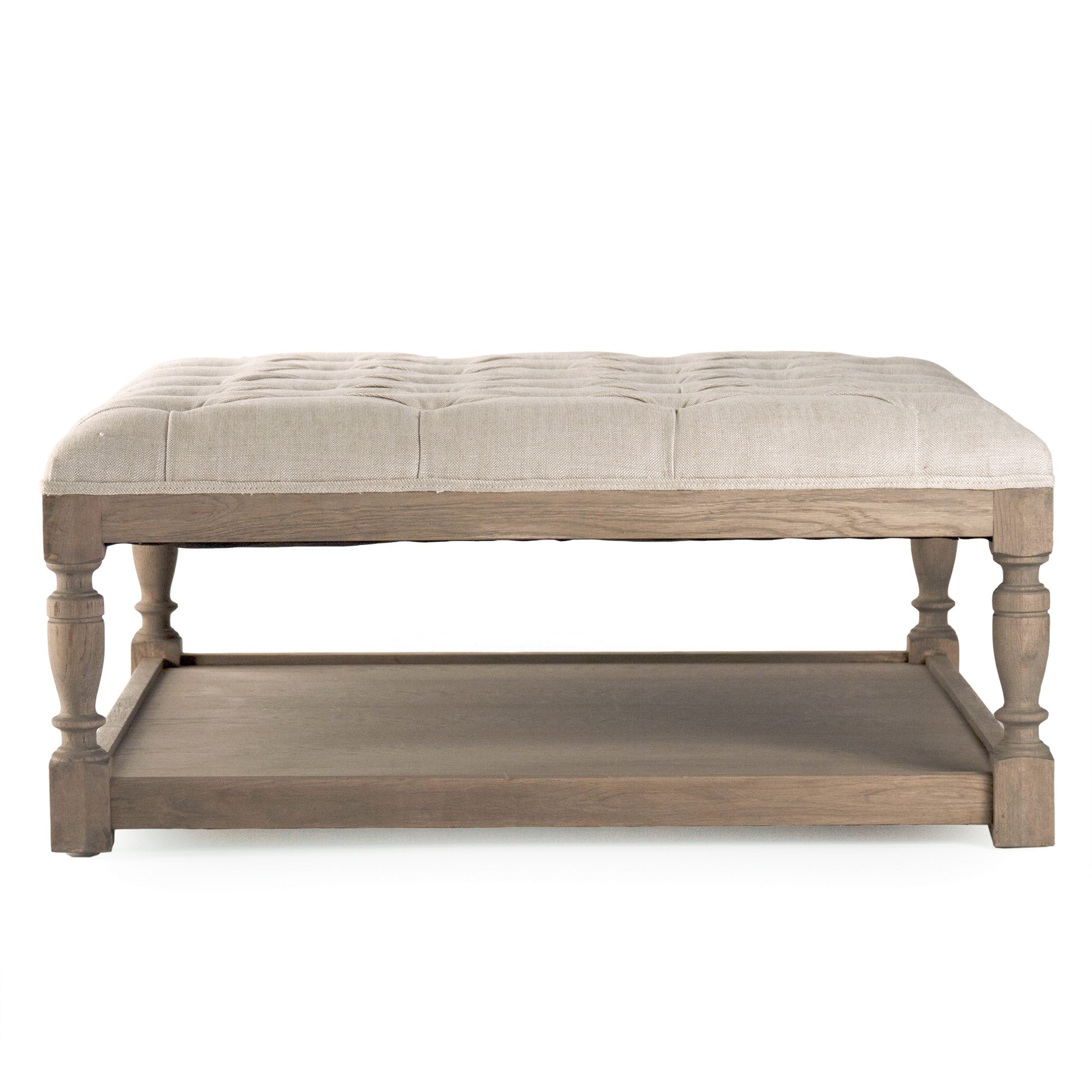 Neutral square ottoman that adapts to various interior styles and settings.
