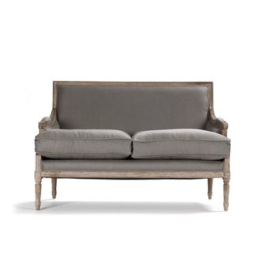 A classic French loveseat sofa with a distressed gray fabric upholstery and a weathered light brown wooden frame, shown against a plain white background.