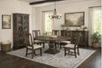 Toulon Dining room set with wooden furniture, round table, and chairs.