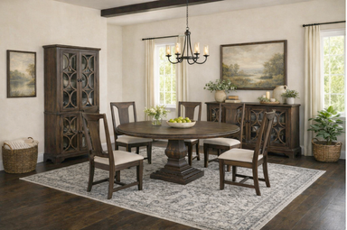Toulon Dining room set with wooden furniture, round table, and chairs.