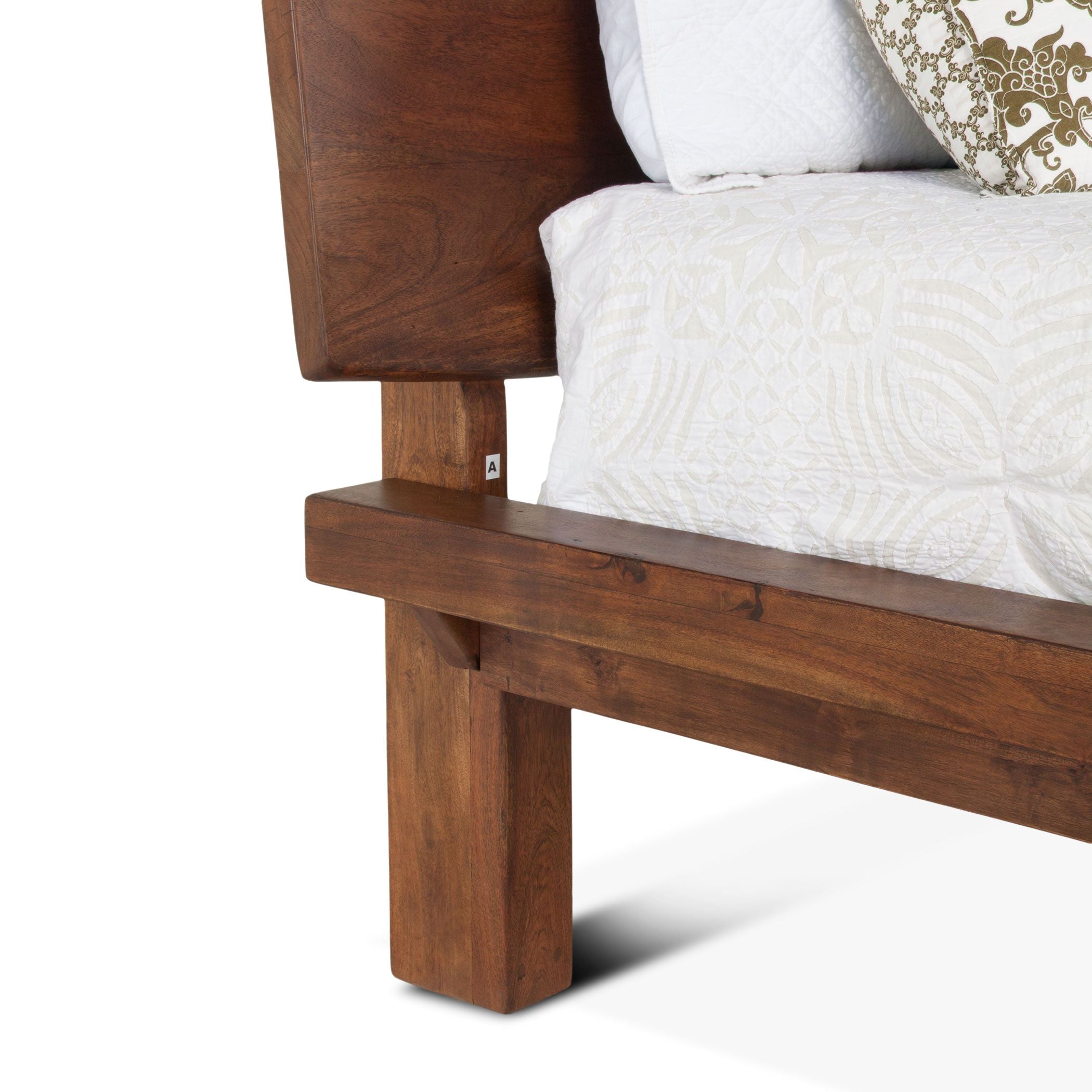 Bed with footboard storage compartments