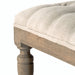 Vintage-inspired ottoman combining comfort and sophisticated style.