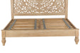 Sustainable mango wood bed in whitewash with floral headboard carvings